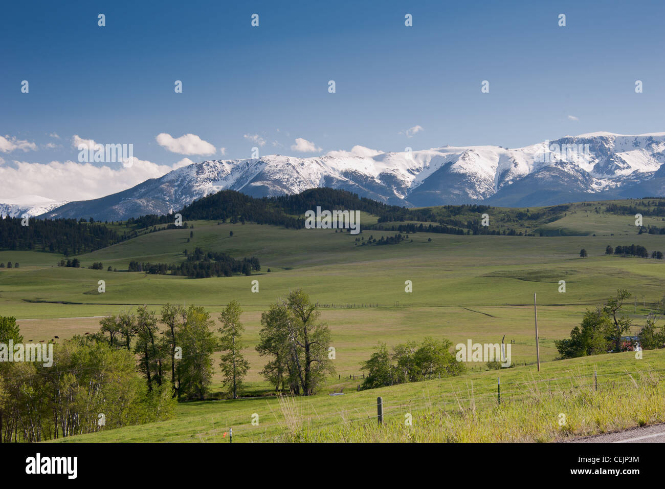 Montana’s Beartooth Mountains are seen in the distance from the Stillwater River valley. Stock Photo