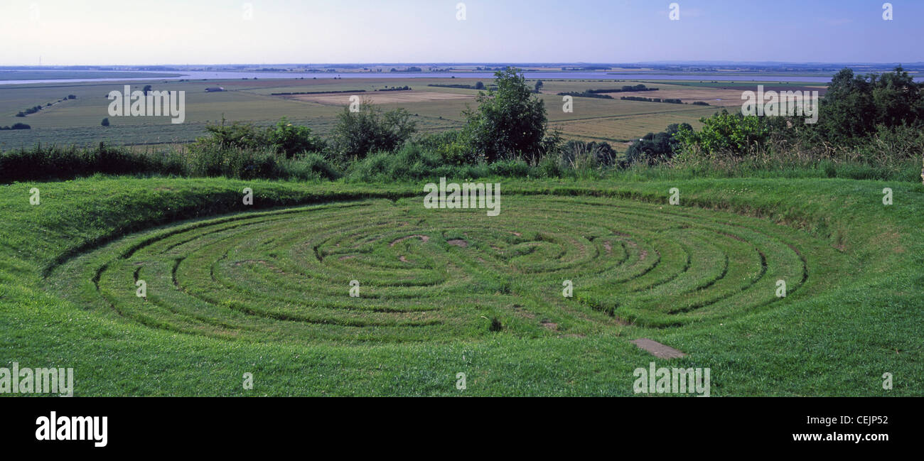 Julians Bower Turf Maze Labyrinth & countryside landscape overlooking the Humber Estuary Alkborough Lincolnshire England UK Stock Photo