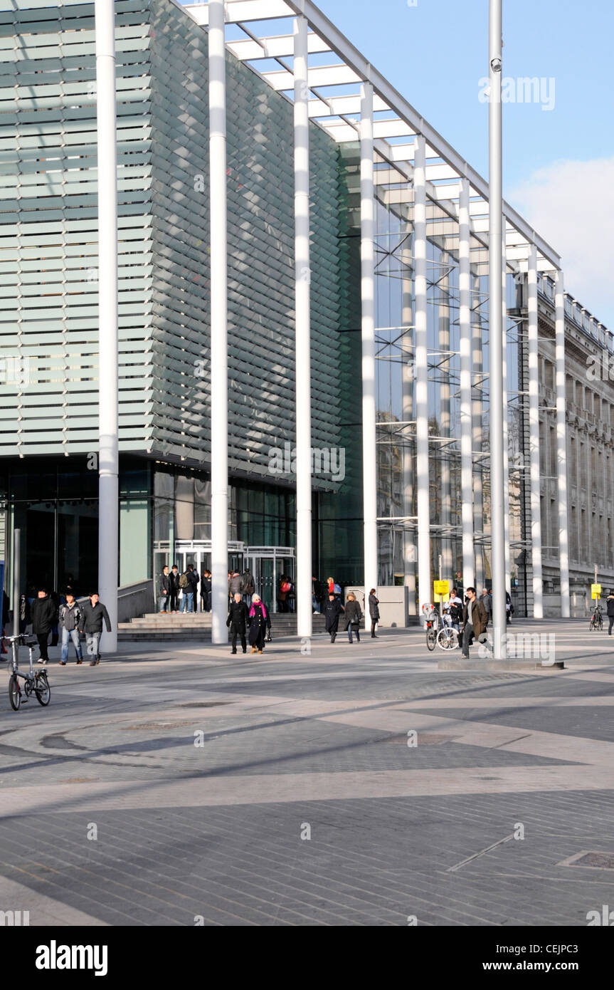 Imperial College modern building London & Exhibition Road shared space highway scheme combining cyclists pedestrians and motor traffic England UK Stock Photo