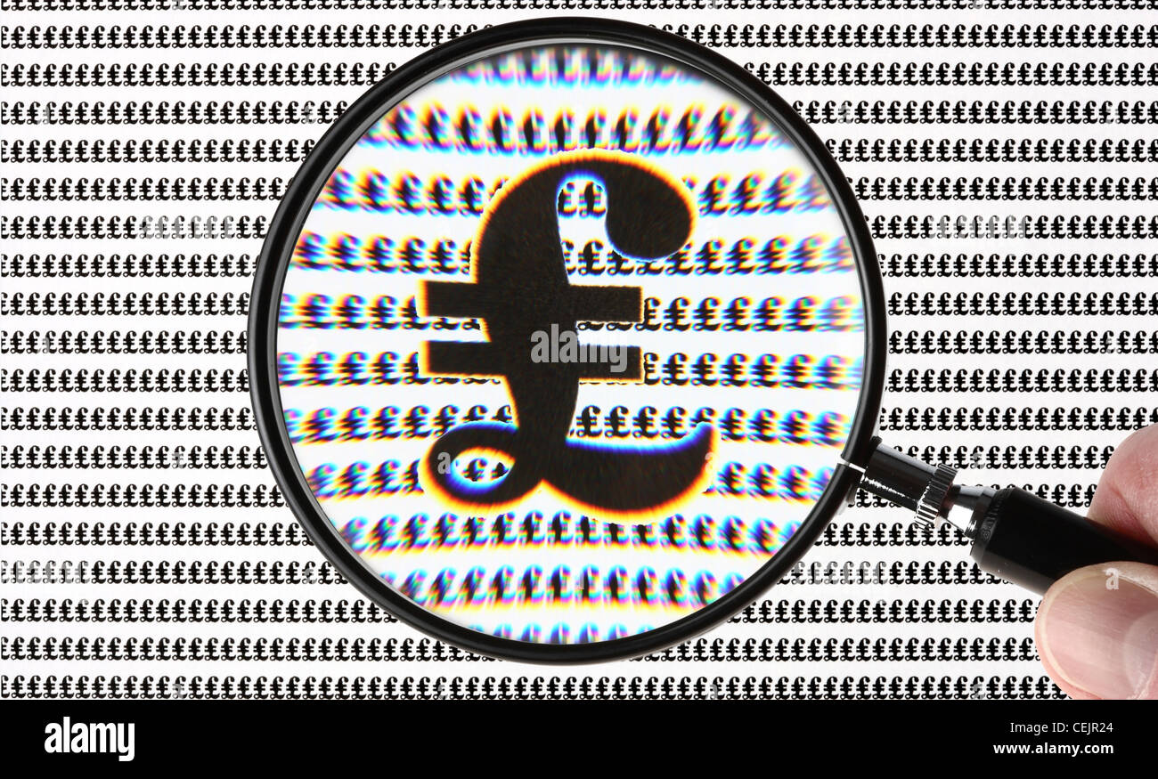 Magnifying glass highlighting a British Pound, ₤, symbol. Symbol image ...