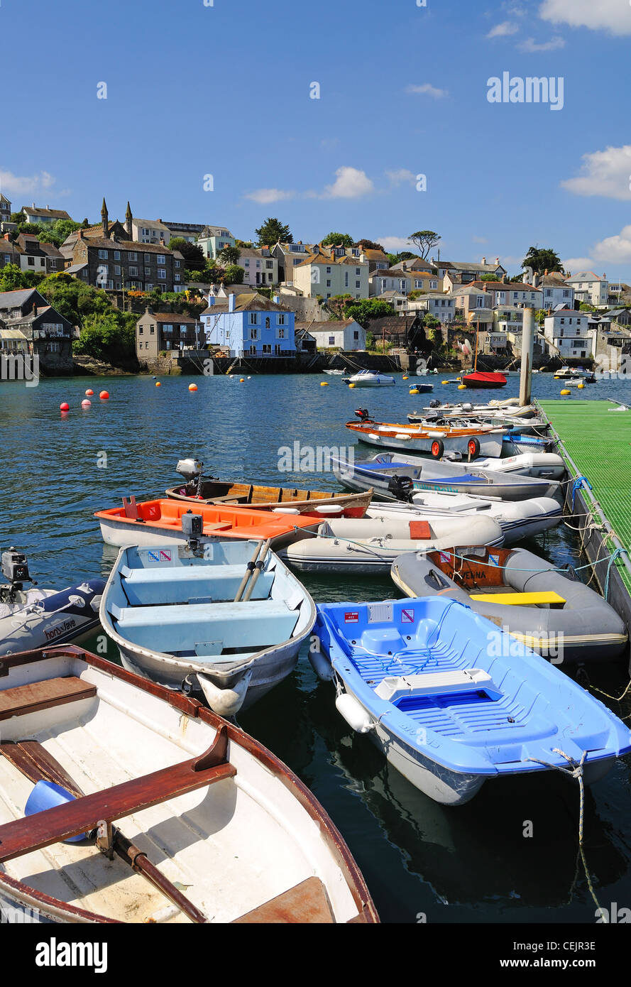 Dinghies moored by the jetty at Polruan in Cornwall, UK Stock Photo