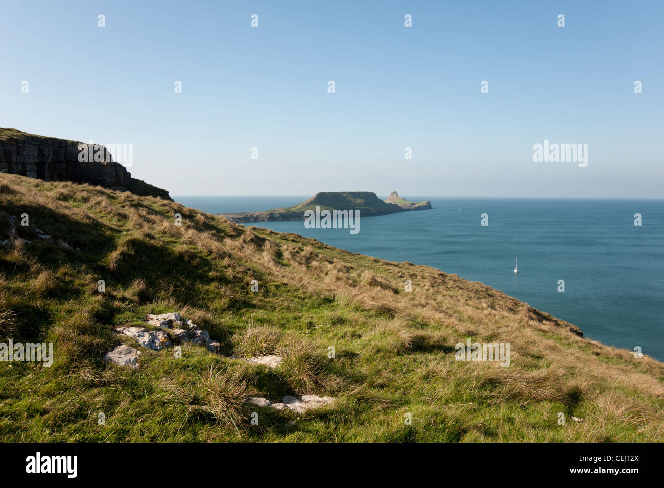A view towards worms head, Rhossili Bay, Gower Peninsula, South Wales Stock Photo