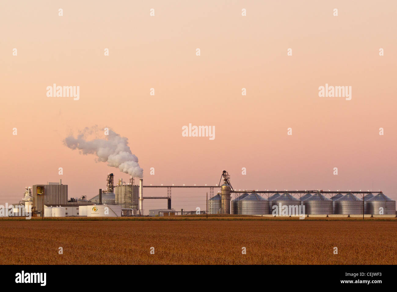 The Tharaldson Ethanol plant at dusk with soybean and corn fields in
