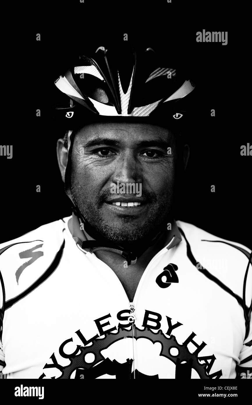 Cyclist Carlos Munoz poses for a portrait after racing in a twenty-five mile criterium in Camarillo, California. Stock Photo