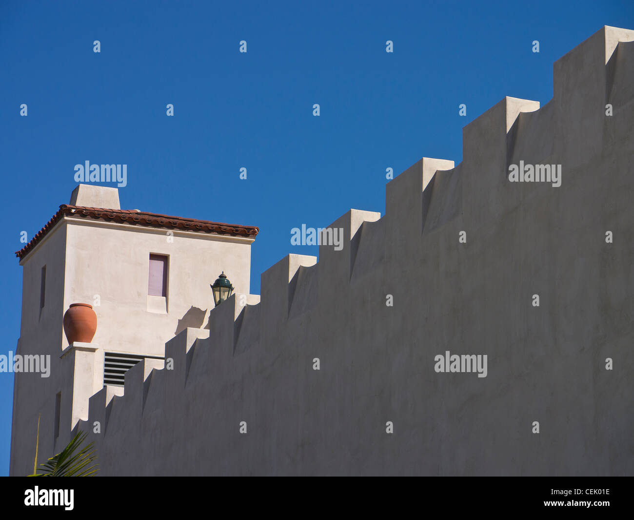 Architectural detail of crenelations on top of wall of a Spanish/Moorish building in Santa Barbara, California. Stock Photo