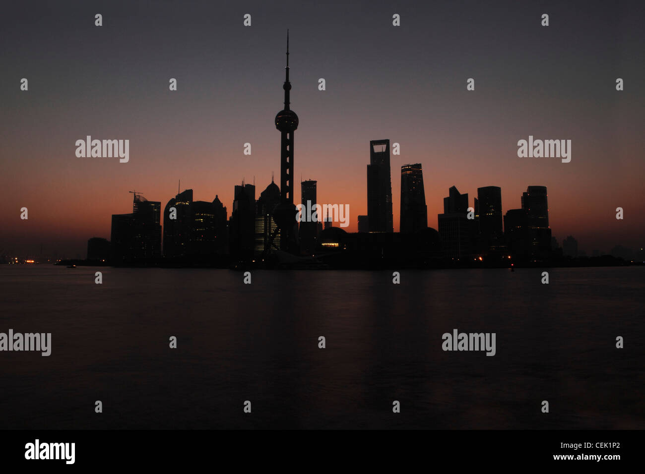 Silhouette of Shanghai skyline at sunset, China Stock Photo - Alamy
