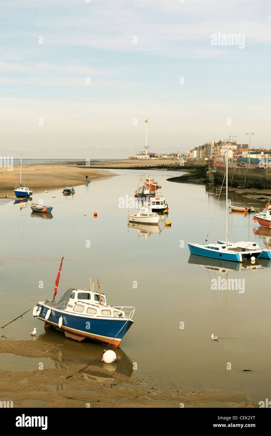 Sailing dinghies and leisure boats on the estuary of the River Clywd at the seaside resort of Rhyl, Denbighshire, north Wales Stock Photo