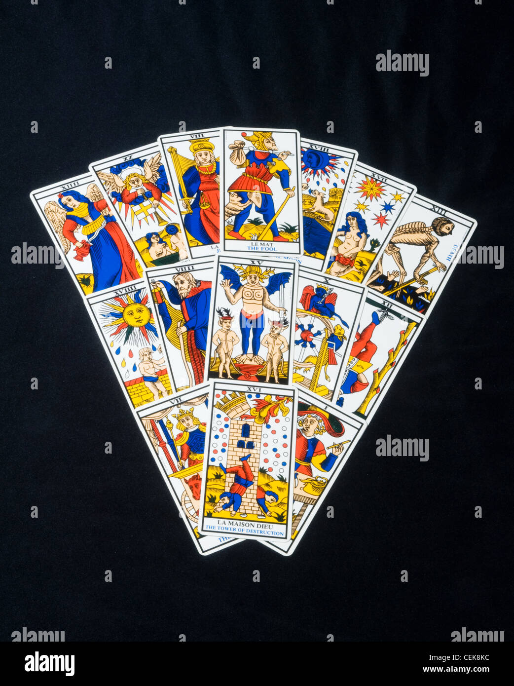 Tarot cards layed out in a triangular tarot spread Stock Photo