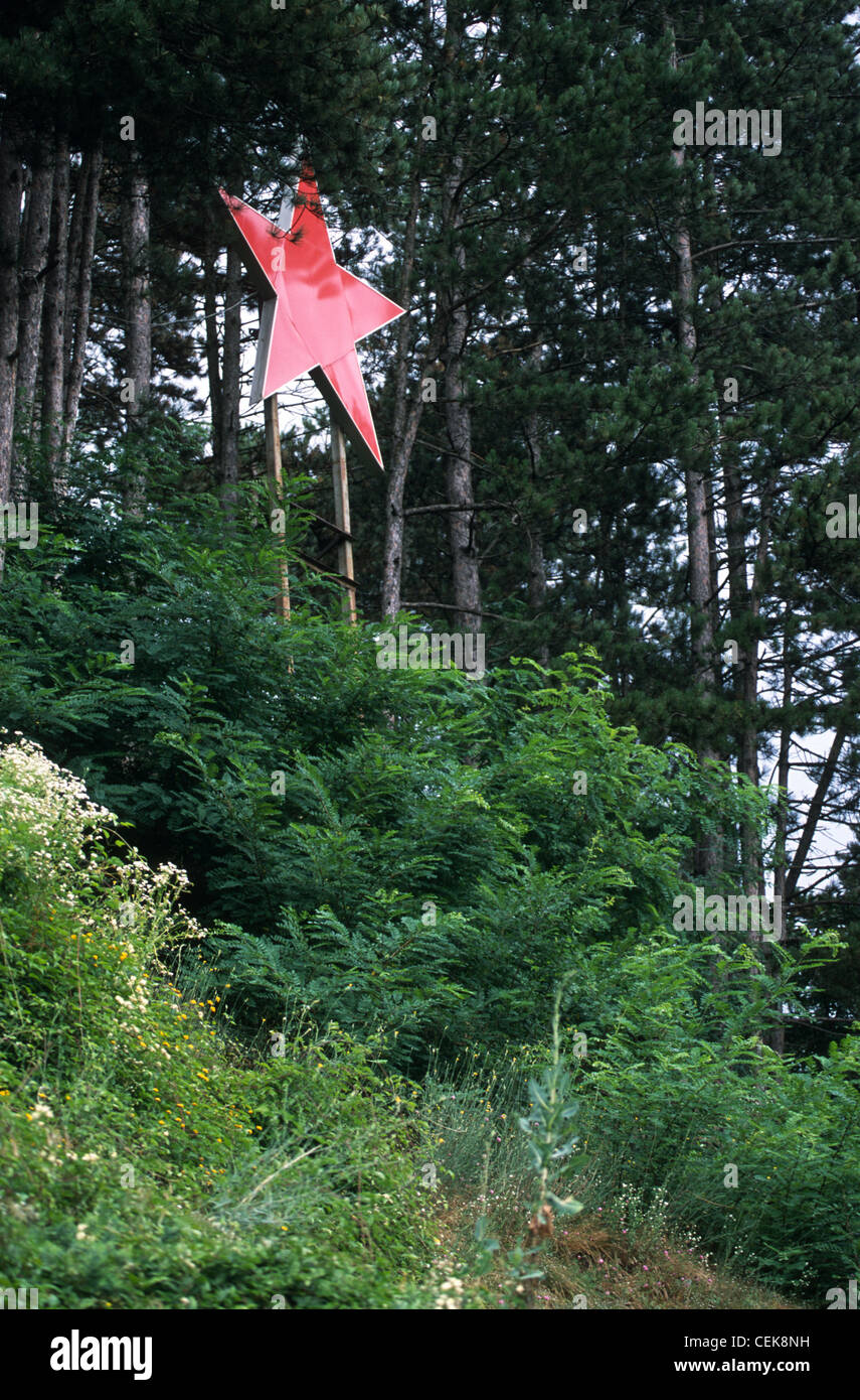 Communistic red star fixed on a wooden construction in a private garden in Bijelo Polje, Montenegro, Balkans Stock Photo