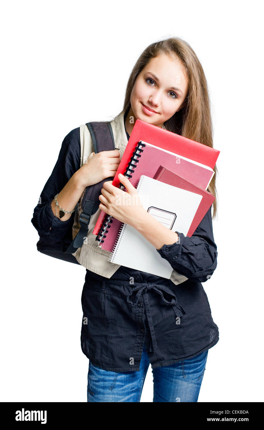 Charming young student girl holding exercise books Stock Photo - Alamy