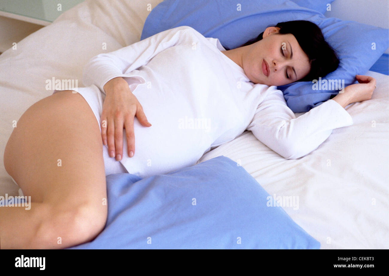 Man Sleeping with Pillow between Legs Stock Photo - Image of bedding,  prevent: 245556014