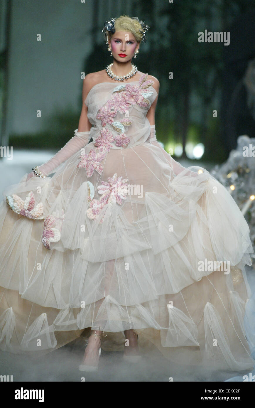 Chanel Paris, Haute Couture A W Strapless cream organza dress ruched and  layered pink embroidered flowers diagonally from Stock Photo - Alamy