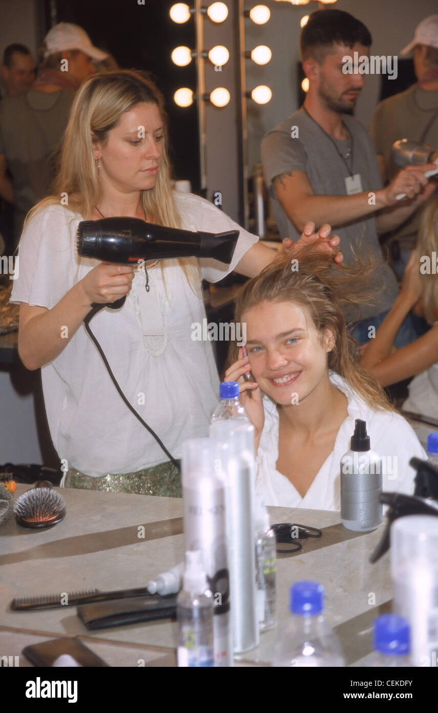 Calvin Klein Backstage New York Ready to Wear Spring Summer Russian model  Natalia Vodianova speaking on mobile phone, as she Stock Photo - Alamy