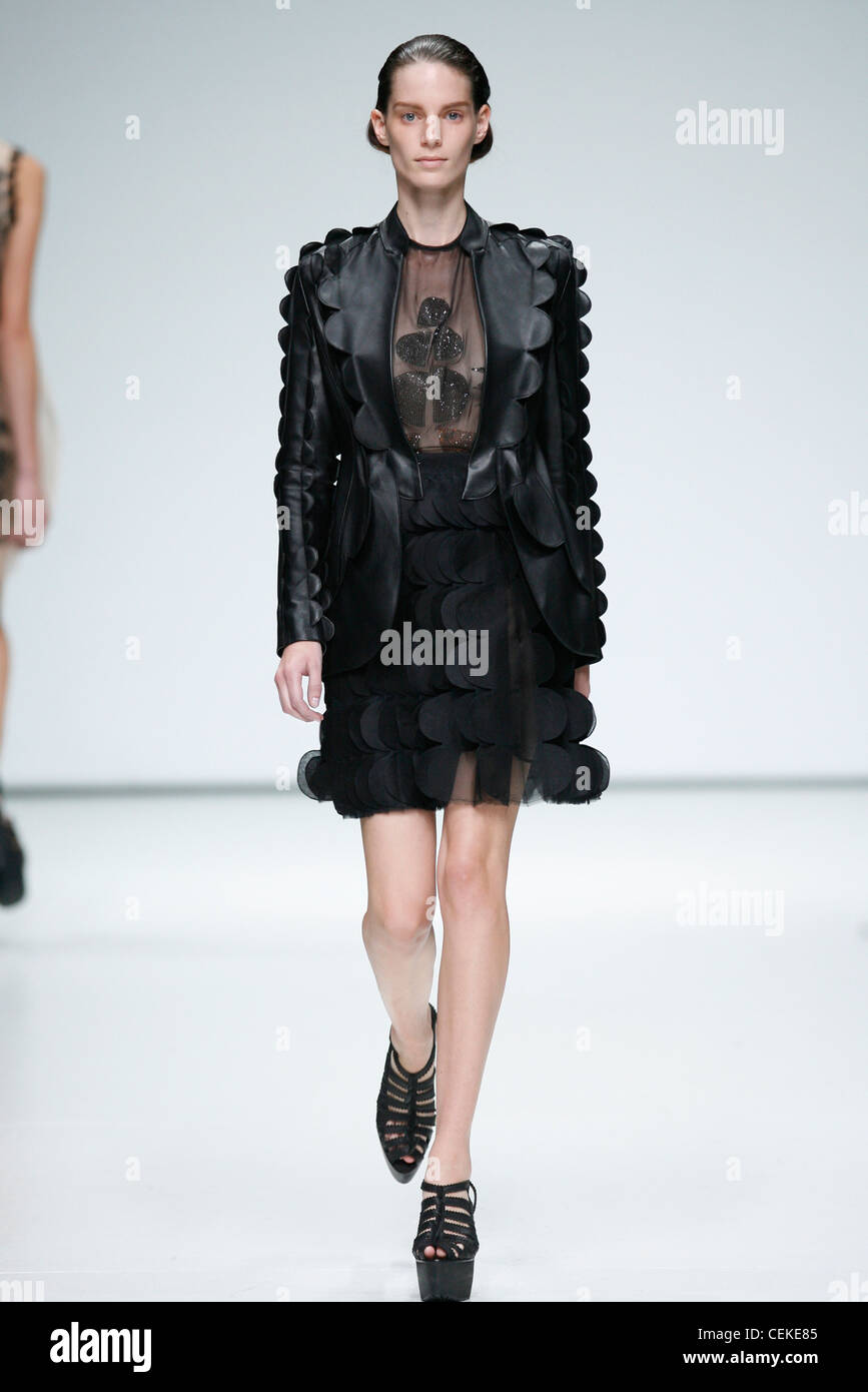 Christopher Kane London Ready to Wear Spring Summer All black scalloped ...