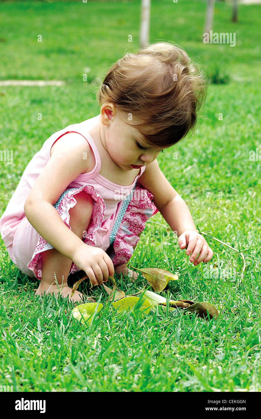 Female baby, pale pink vest top, pink ruffle trim trousers, crouched