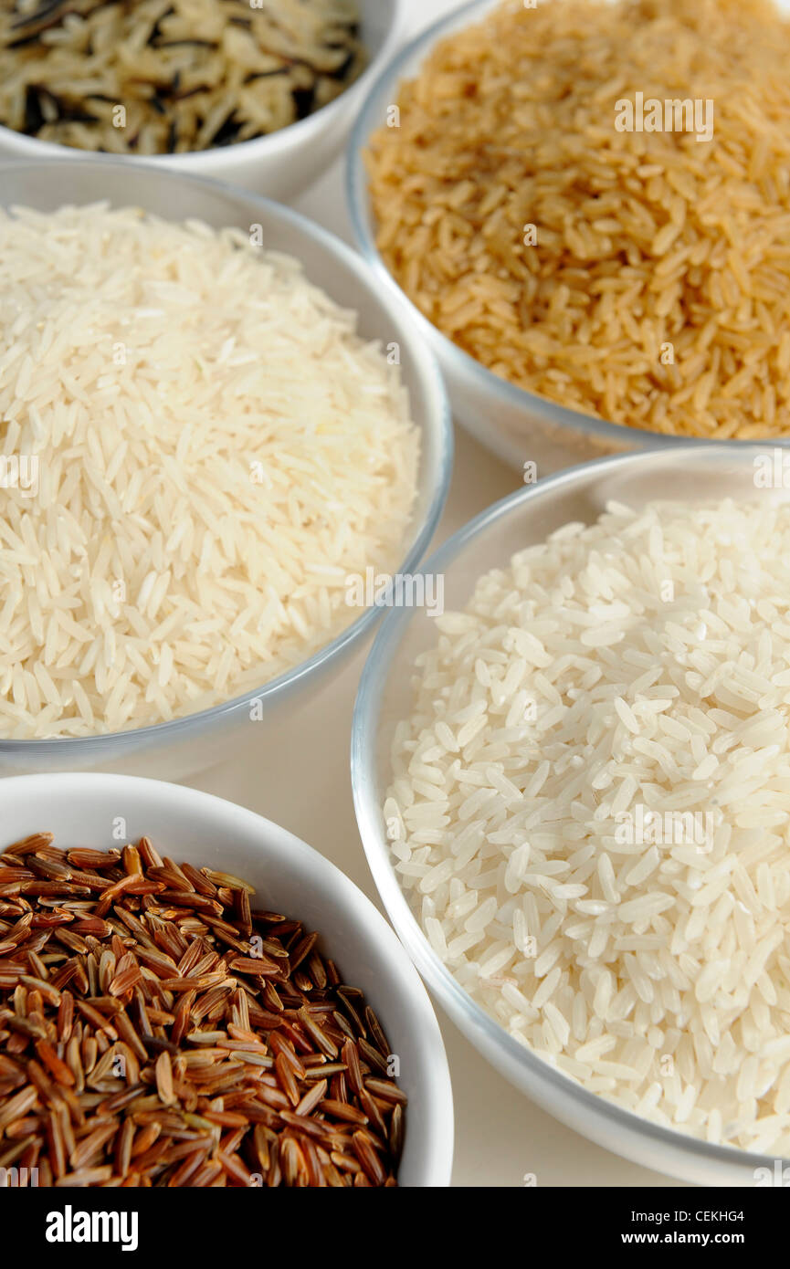 Five bowls of different varieties of rice Stock Photo