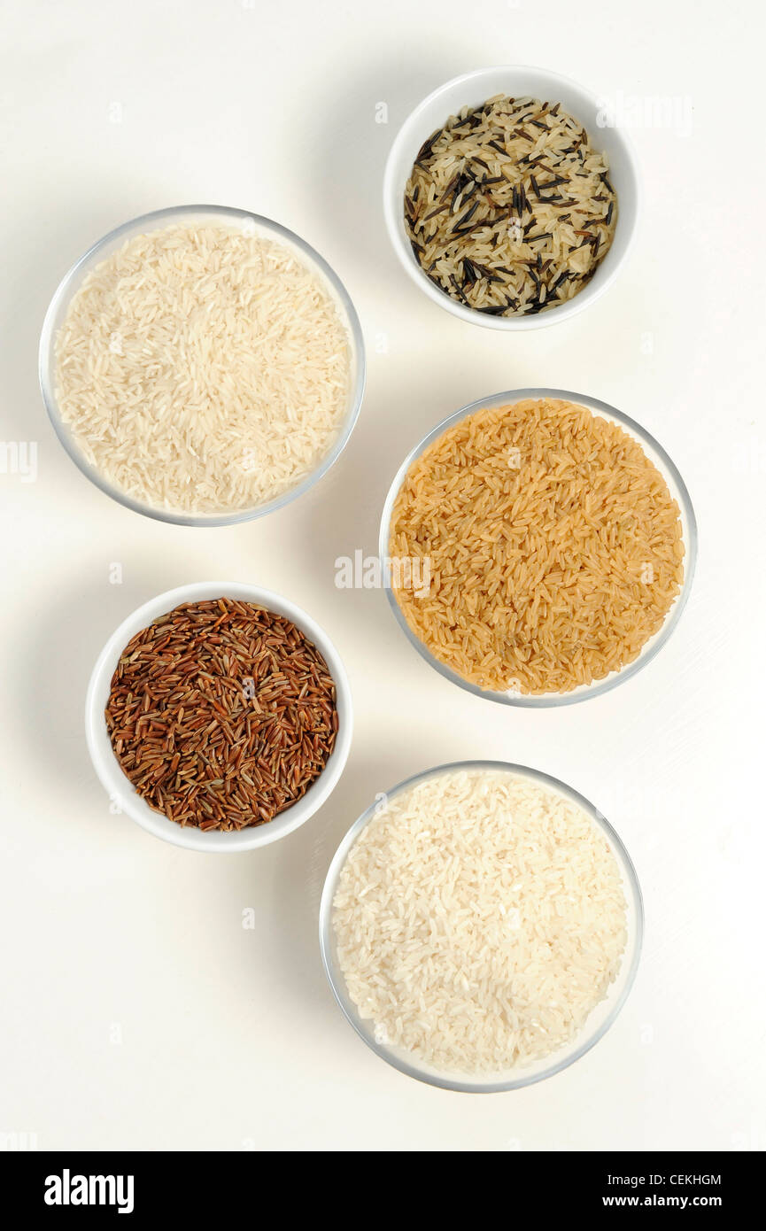 Five bowls of different varieties of rice Stock Photo