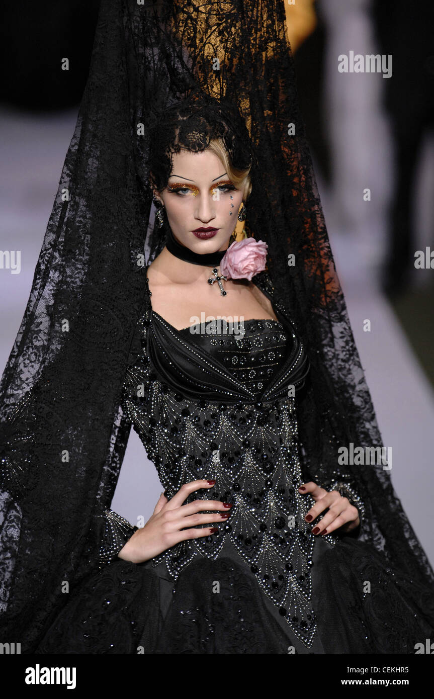 Christian Dior Haute Couture Autumn Winter th Anniversary of Dior Model  Marta Berzkalna wearing black full skirted dress Stock Photo - Alamy