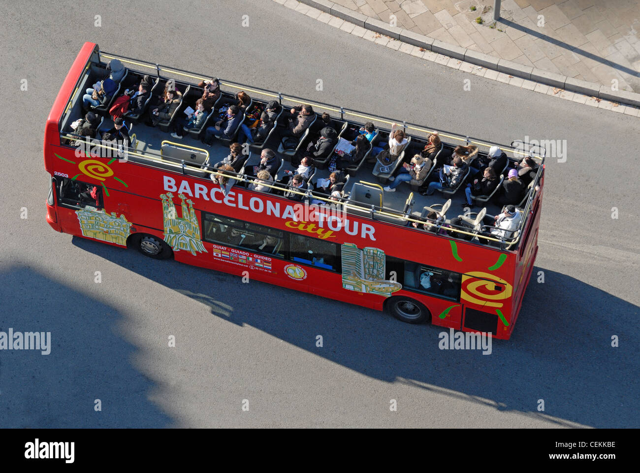 Barcelona, Spain. Open-topped tourist bus seen from the top of the Monument a Colom / Monument to Columbus Stock Photo