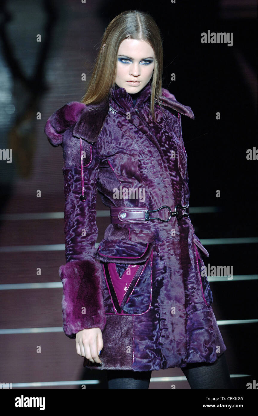 Versace Ready to Wear Milan A W Brunette female wearing a crushed velvet  coat with fur cuffs Stock Photo - Alamy