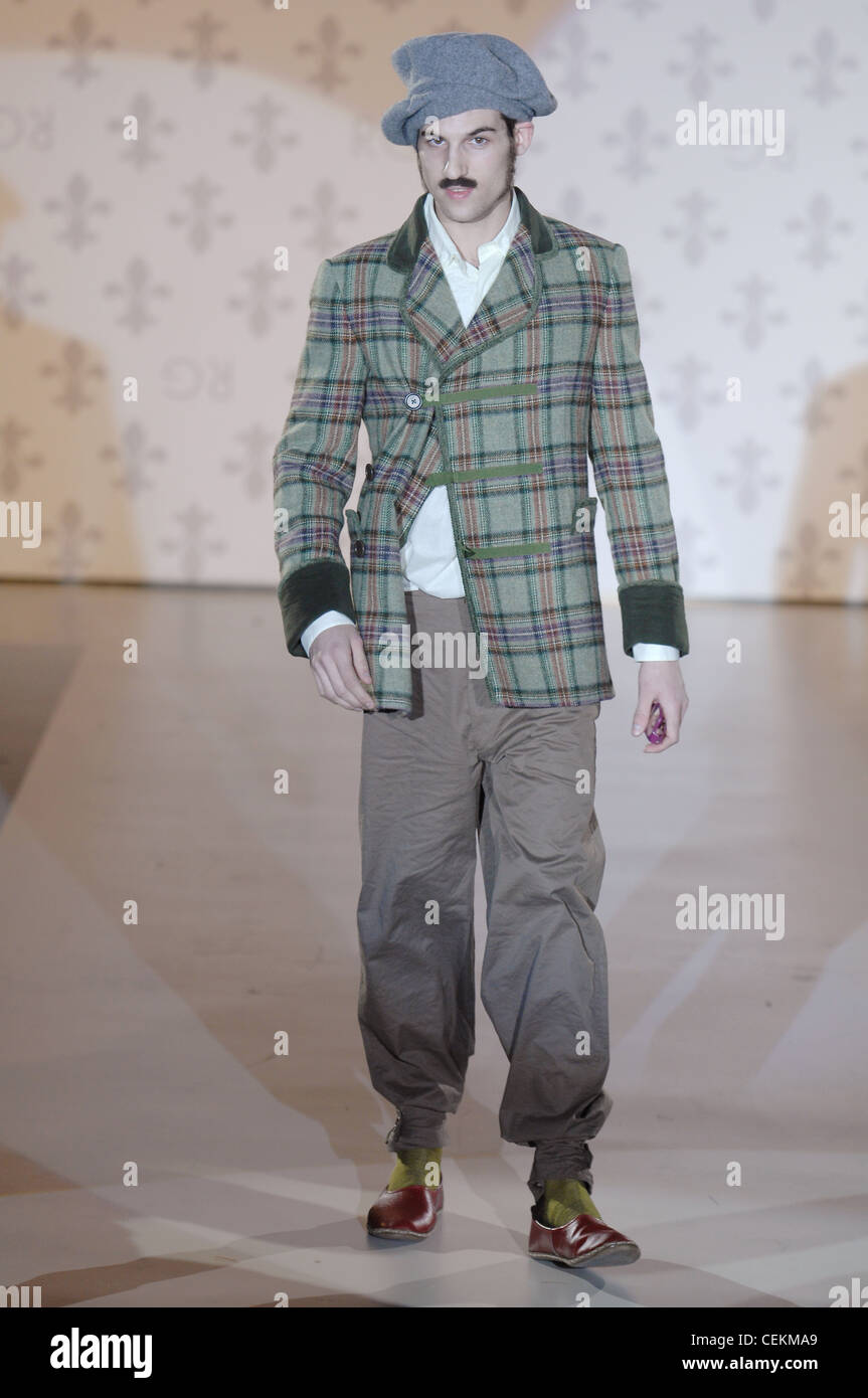 Romeo Gigli Milan Ready to Wear Autumn Winter Eccentric Style moustachioed male wearing plaid jacket over shite shirt and Stock Photo Alamy