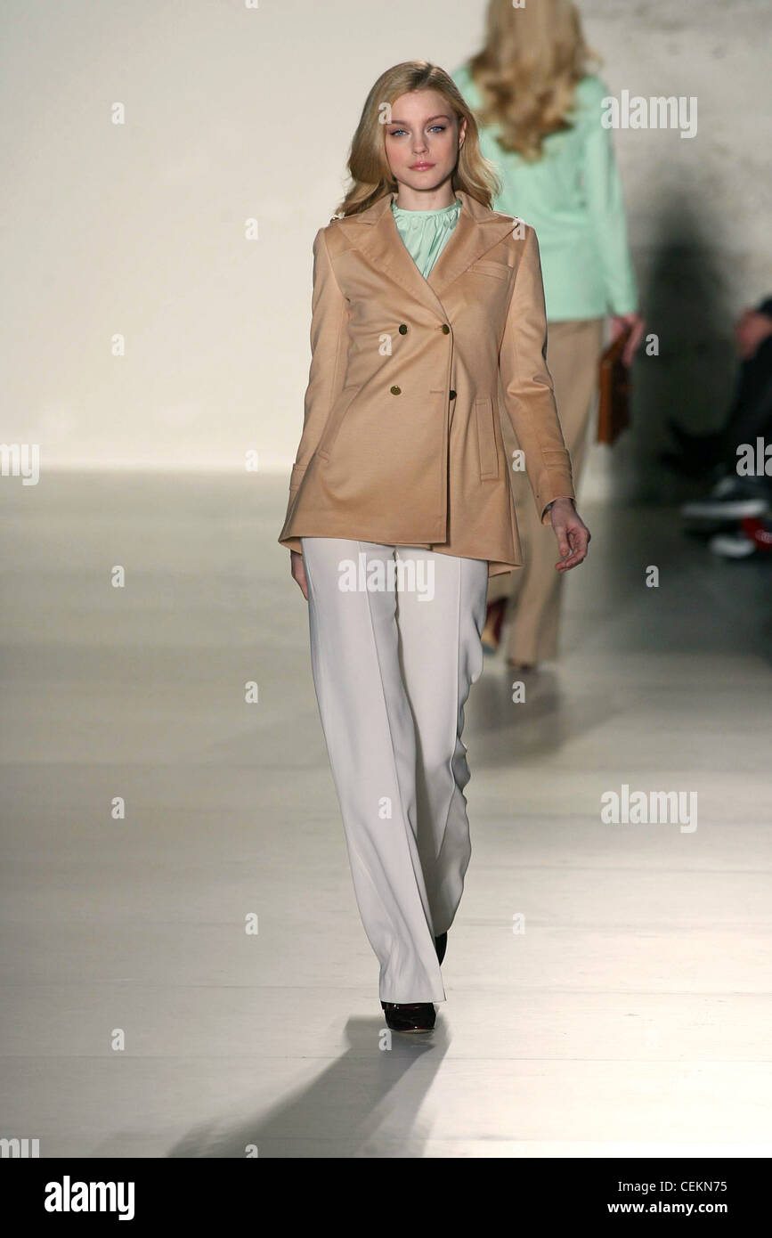 model Jessica Stam wearing brown blazer 