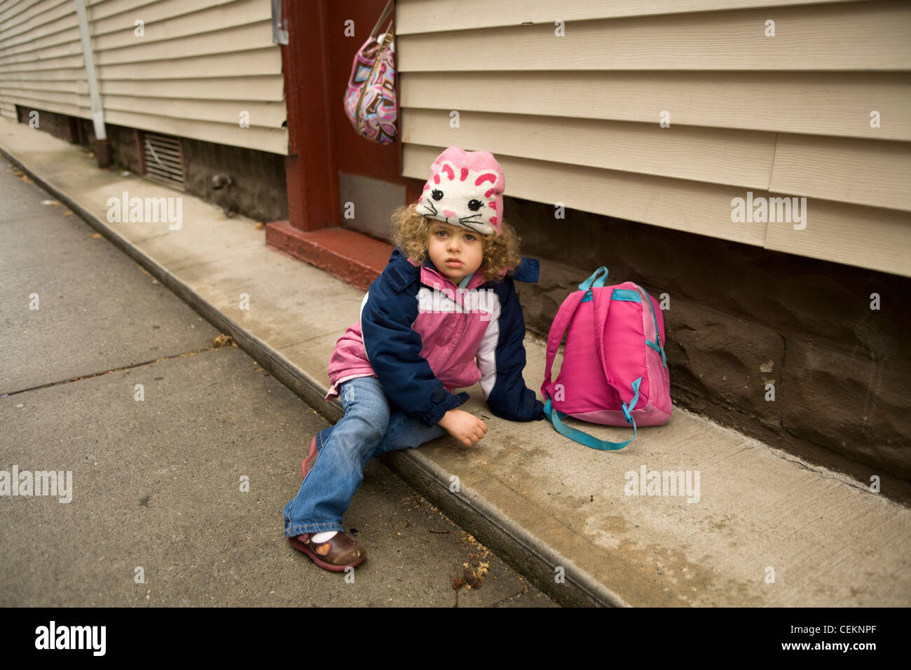 Sad girl sitting alone in classroom hi-res stock photography and images ...