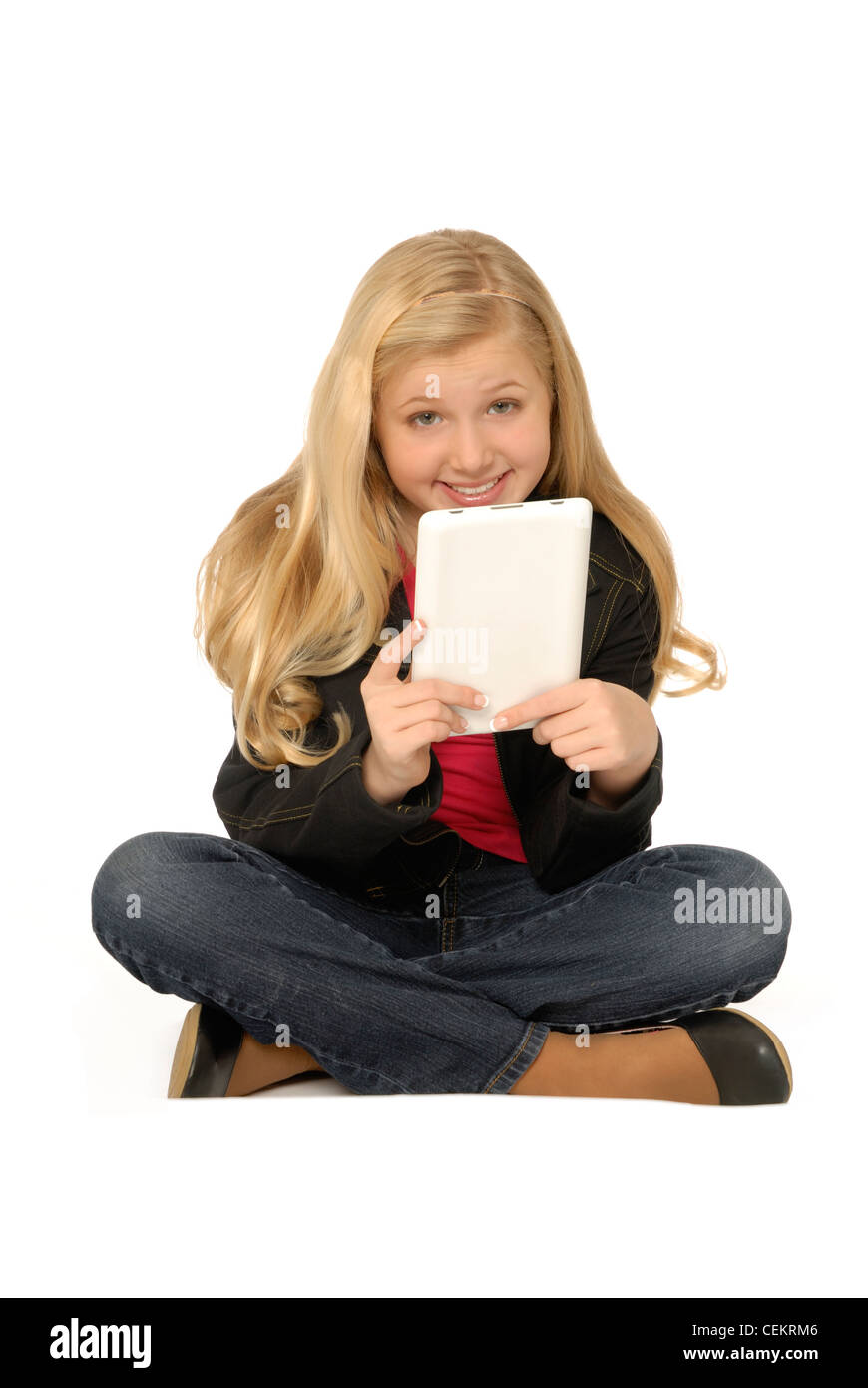 Ten year old girl holding tablet computer Stock Photo Alamy