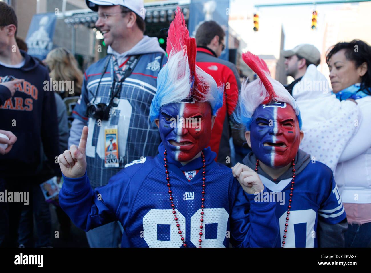 Young football fans with faces painted and dressed New York Giants fans. Superbowl XLVI Indianapolis, Indiana.  Stock Photo