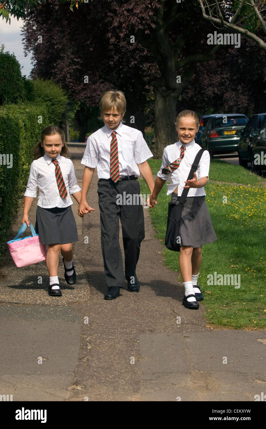 School uniform girl full length skirt hi-res stock photography and ...
