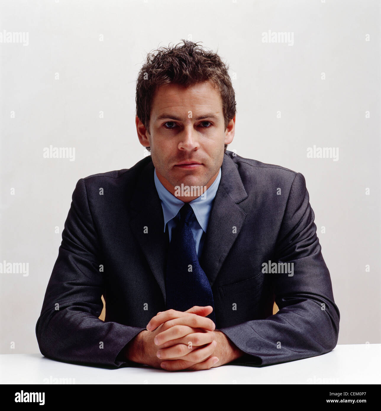 blue suit dark blue shirt