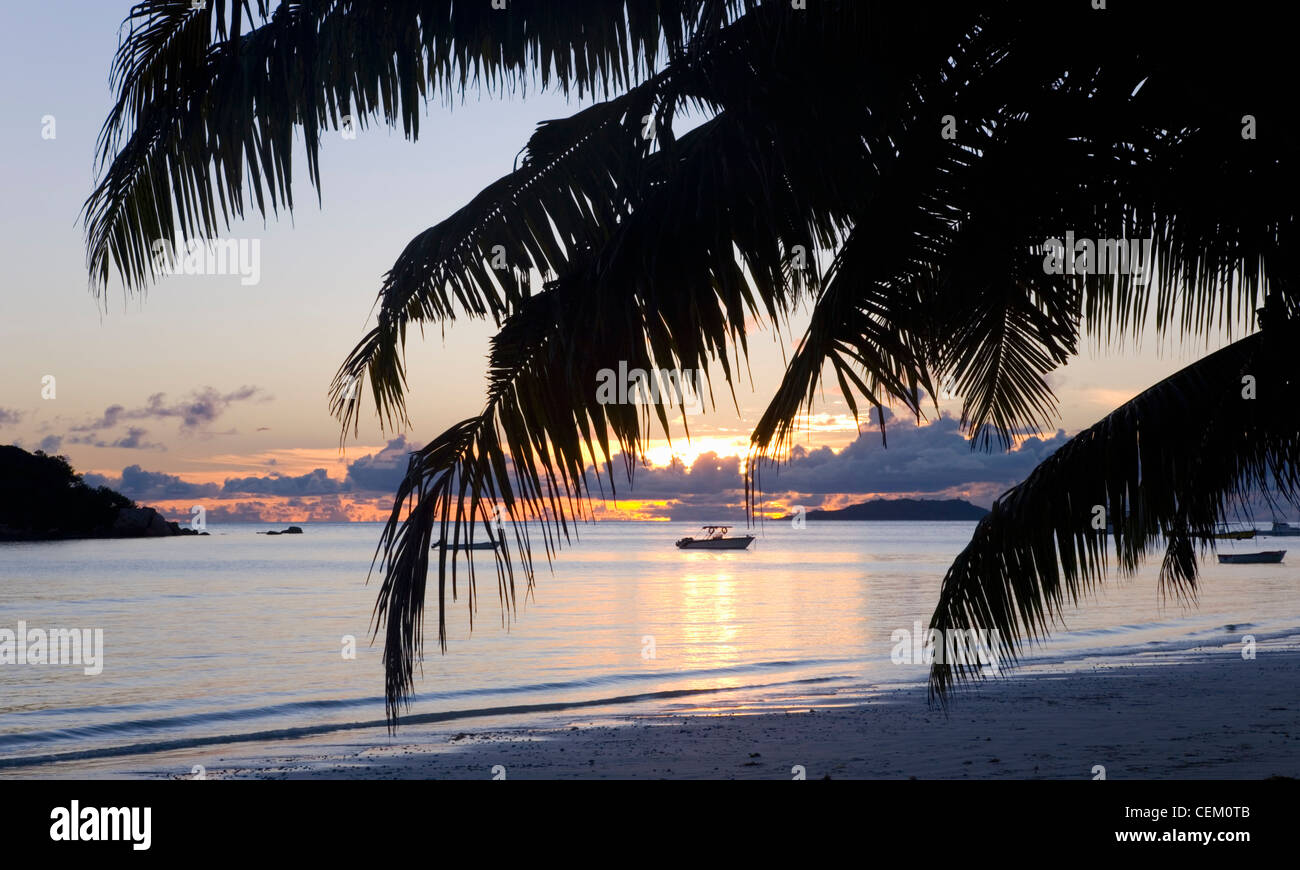 Anse Volbert, Praslin, Seychelles. View across the bay at sunrise. Stock Photo