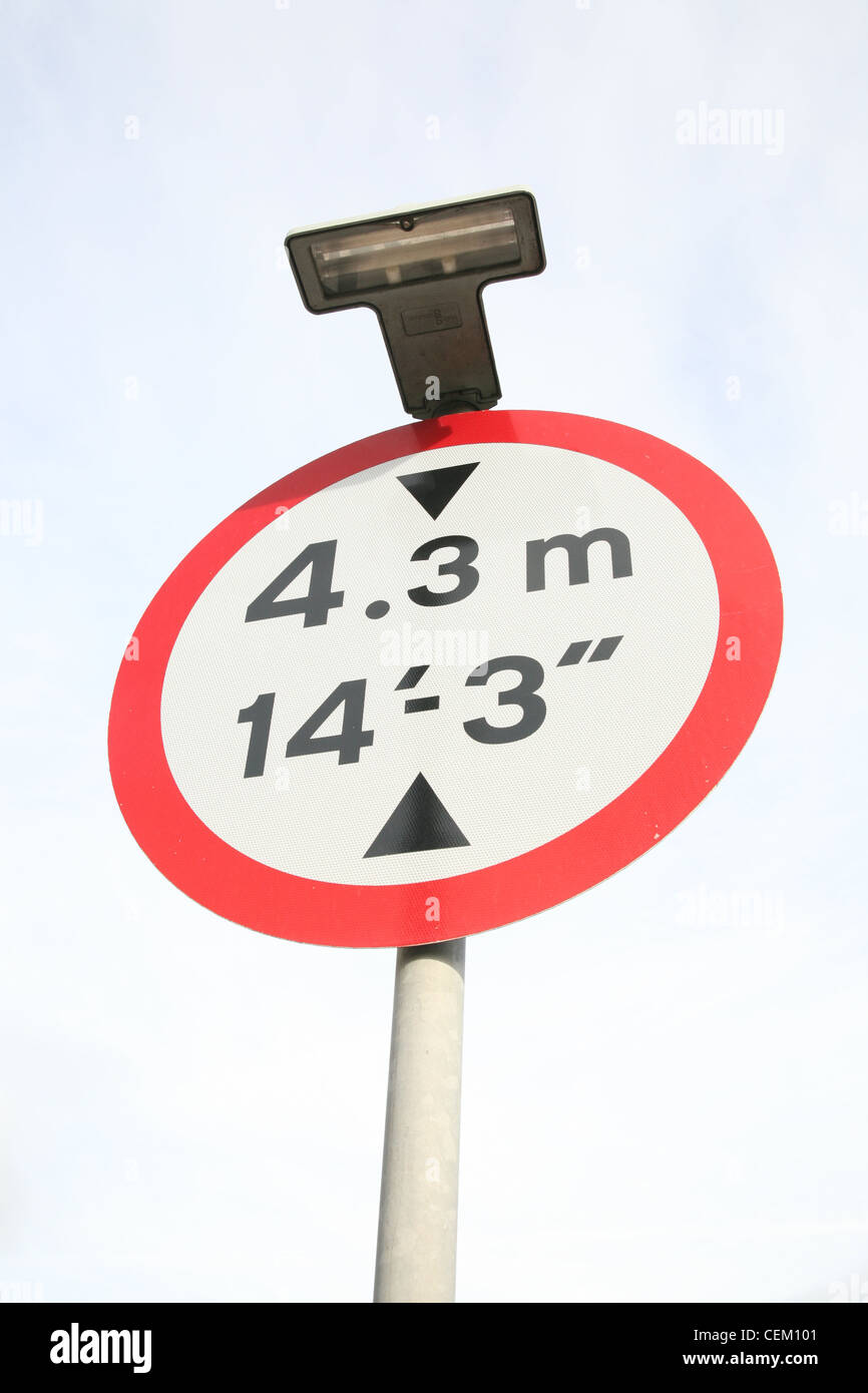 height limit sign warning of a low bridge Stock Photo