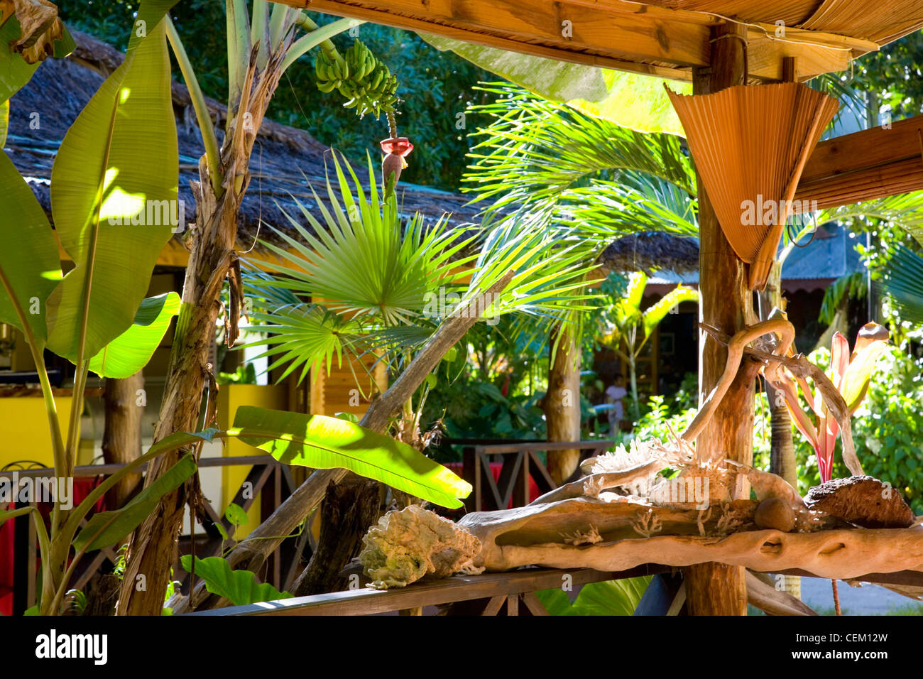 Anse Volbert, Praslin, Seychelles. Traditional restaurant decorated with tropical vegetation and local materials. Stock Photo