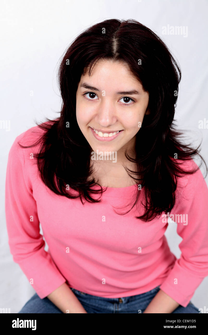 portrait of pretty young latina girl smiling Stock Photo