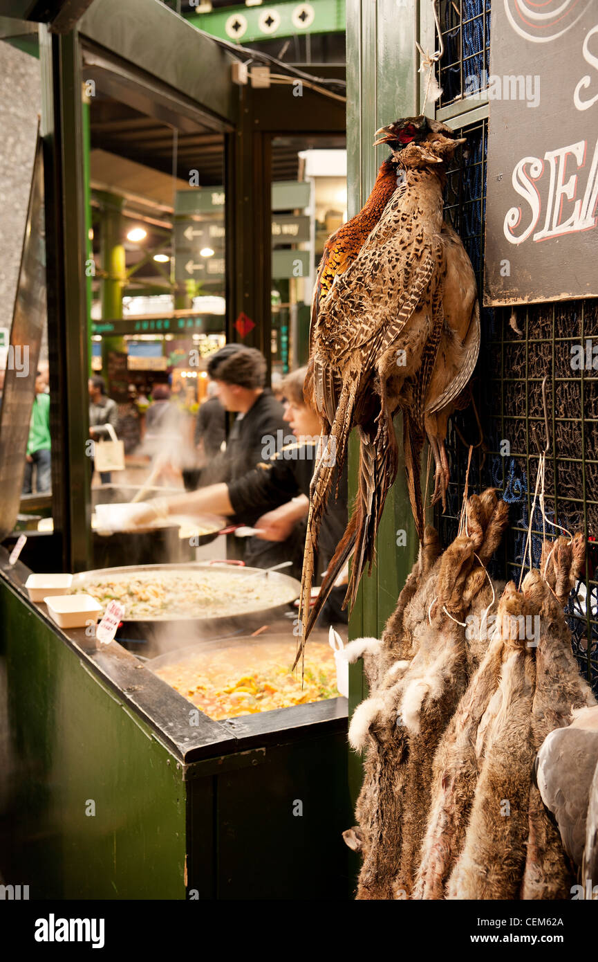 Various Game Birds, Rabbit and Hare hanging on display for sale on a ...