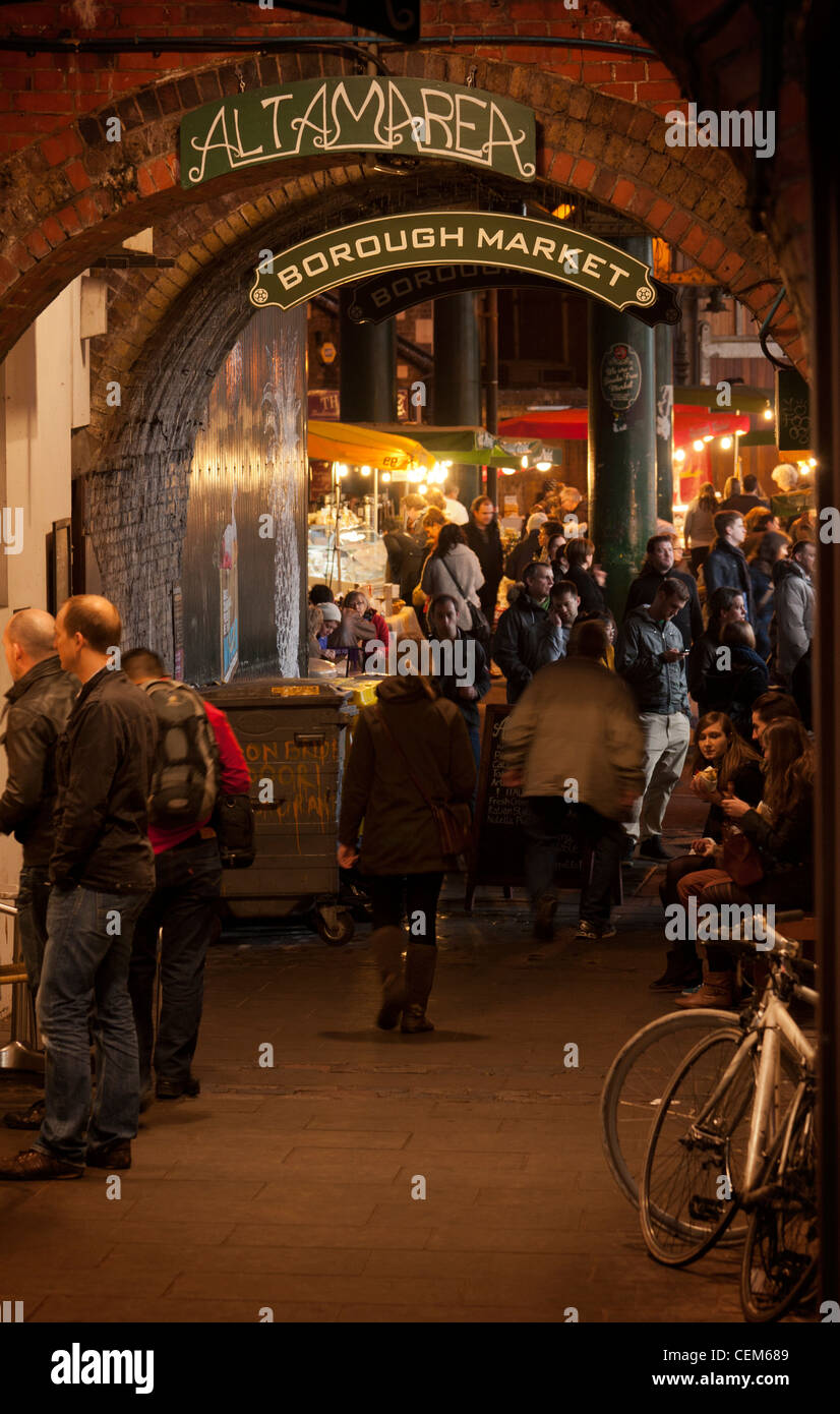 A side entrance to a very busy Borough Market in the late afternoon. South East London England UK Stock Photo