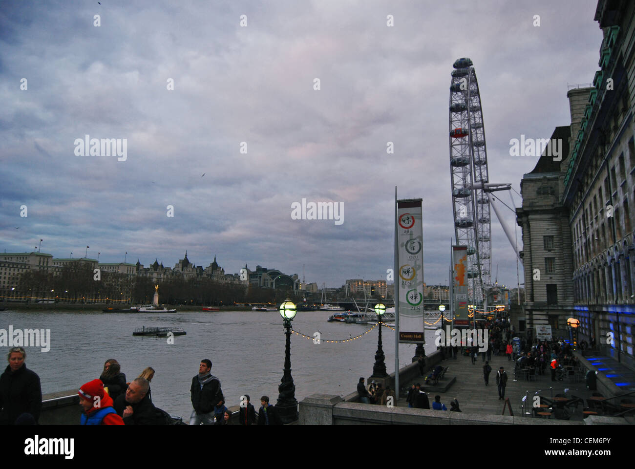 London Eye - sightseeing London, United Kingdom - popular tourist location - giant ferris wheel - at river thames Stock Photo