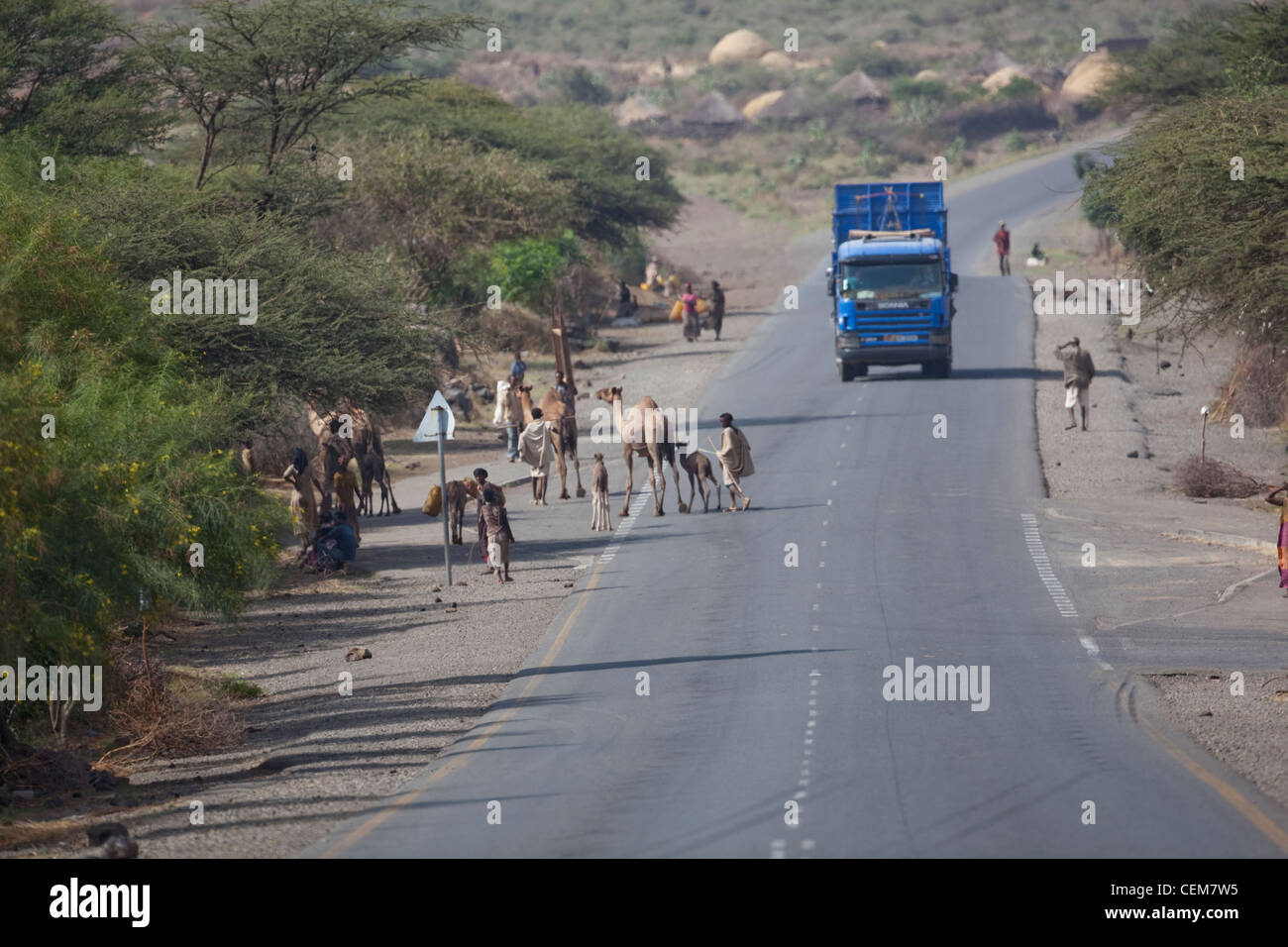 Highway, Abiata Shala. Road vehicles and Camels. Awassa. Ethiopia. Stock Photo