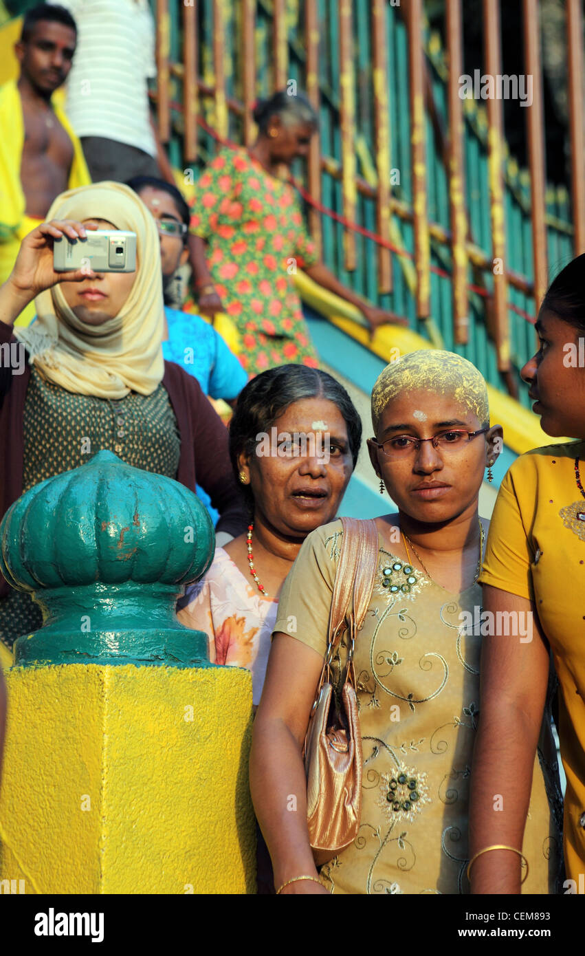 People on the Batu Caves steps during Thaipusam Hindu Festival near Kuala Lumpur. Stock Photo