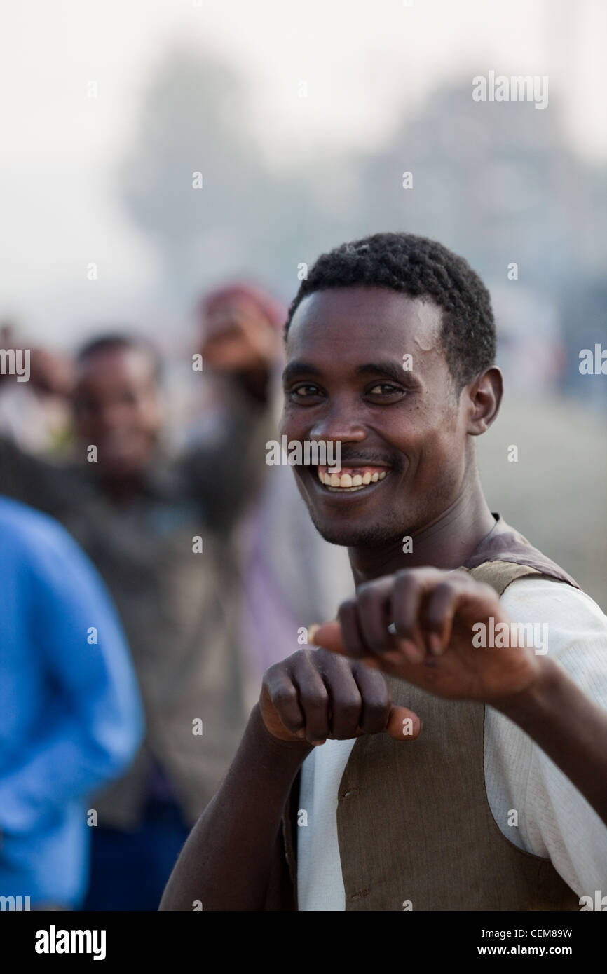 Young Man humorously pretending to box with fists. Wendogenet. Ethiopia. Stock Photo