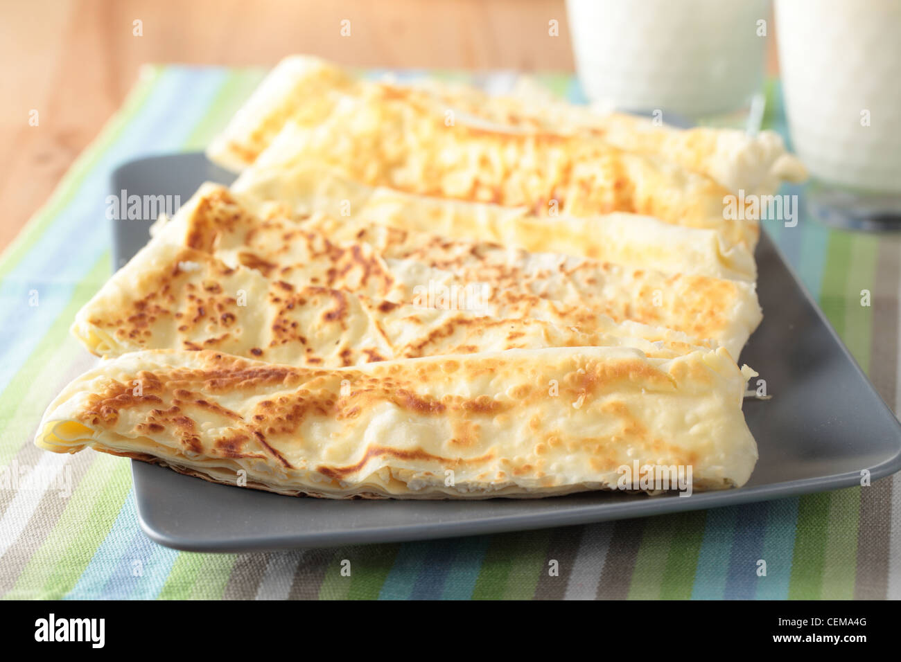 Slices of gozleme with cheese on a plate Stock Photo
