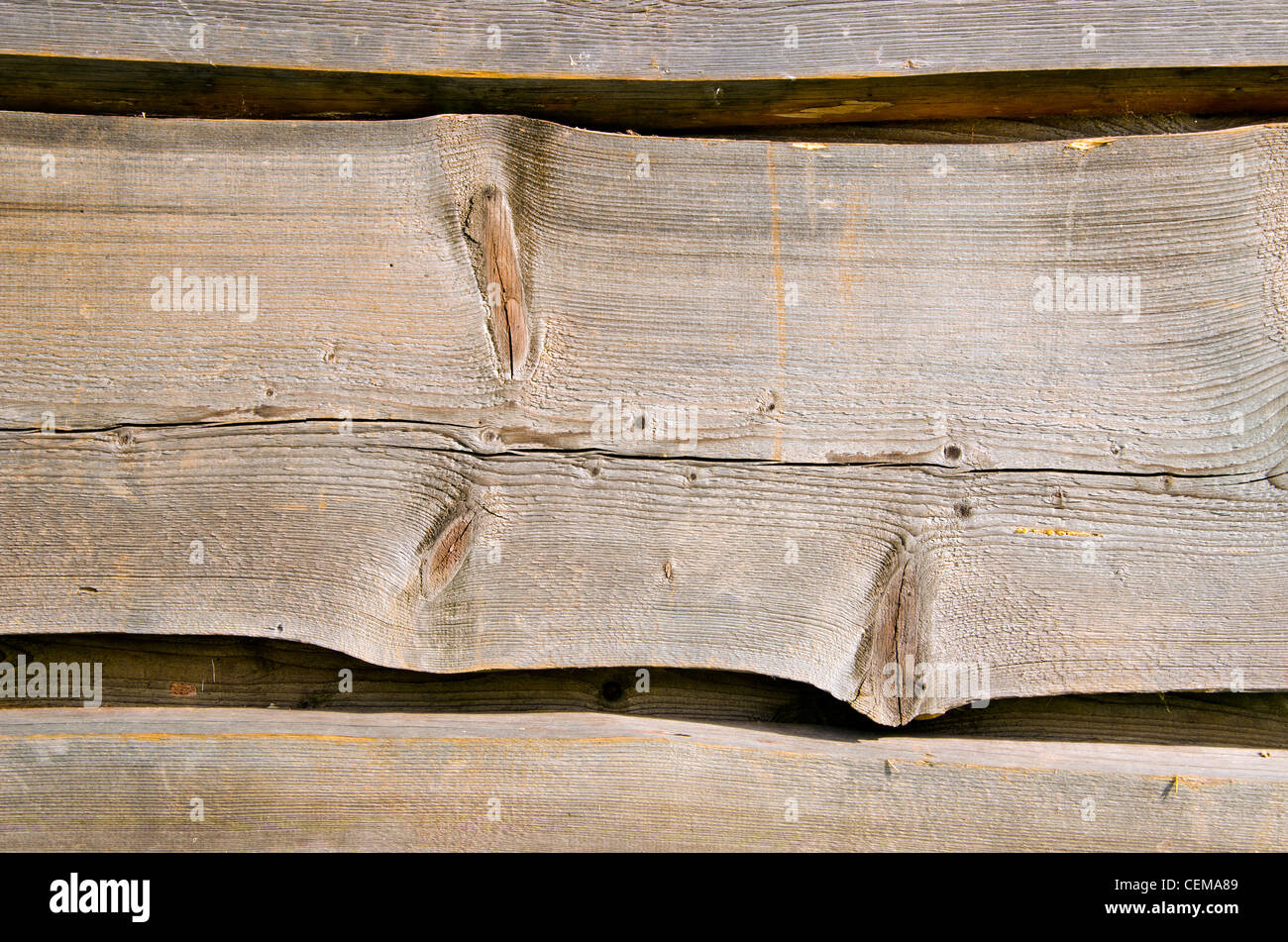 Wooden village house walls carved planks closeup background. Stock Photo