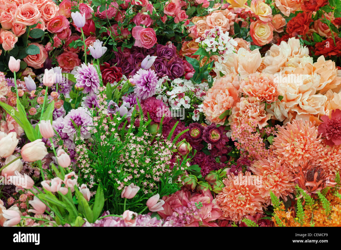 Background from a variety of artificial flowers Stock Photo Alamy