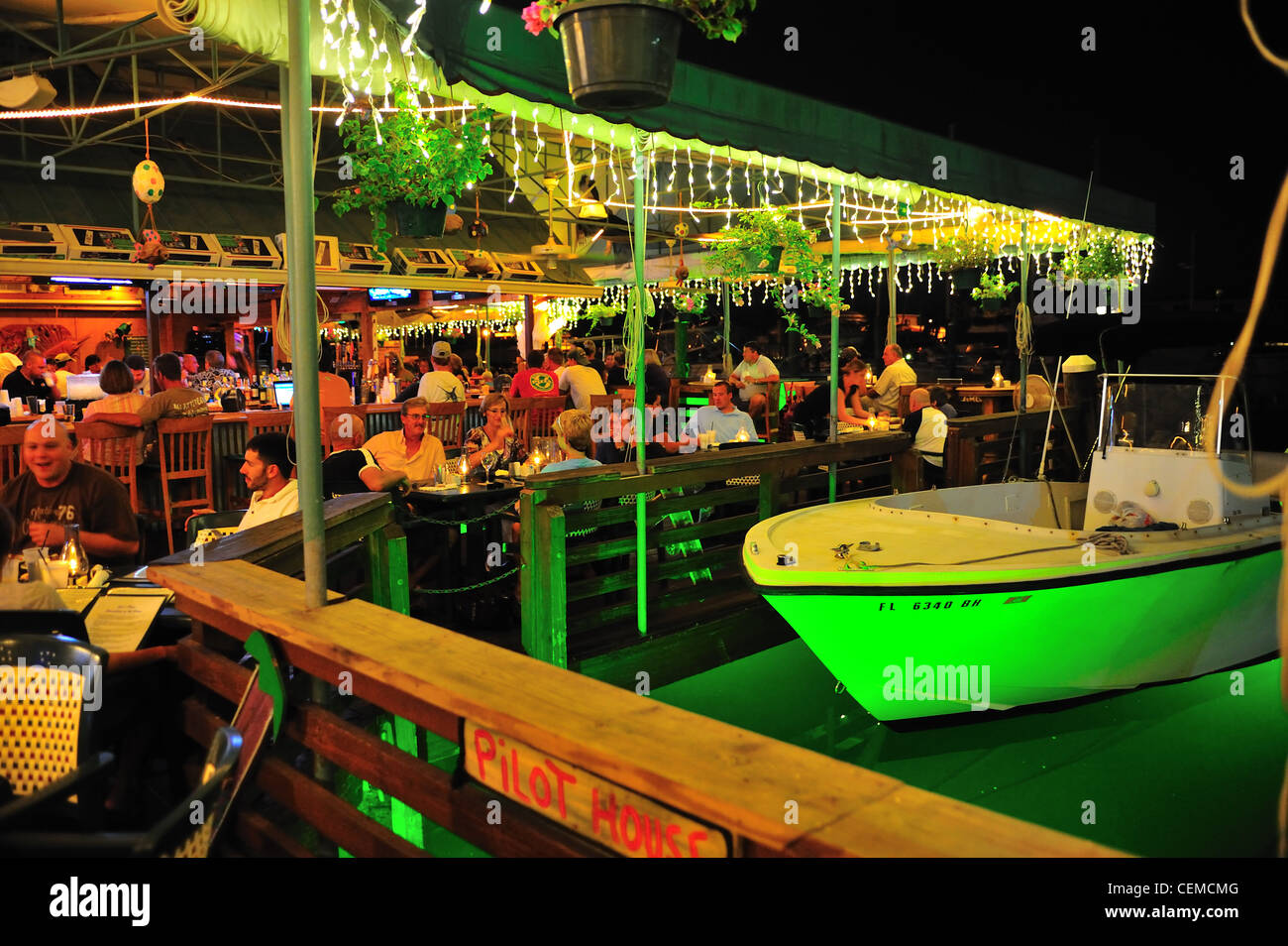 Key Largo Florida Restaurant at night time with boat parking Stock