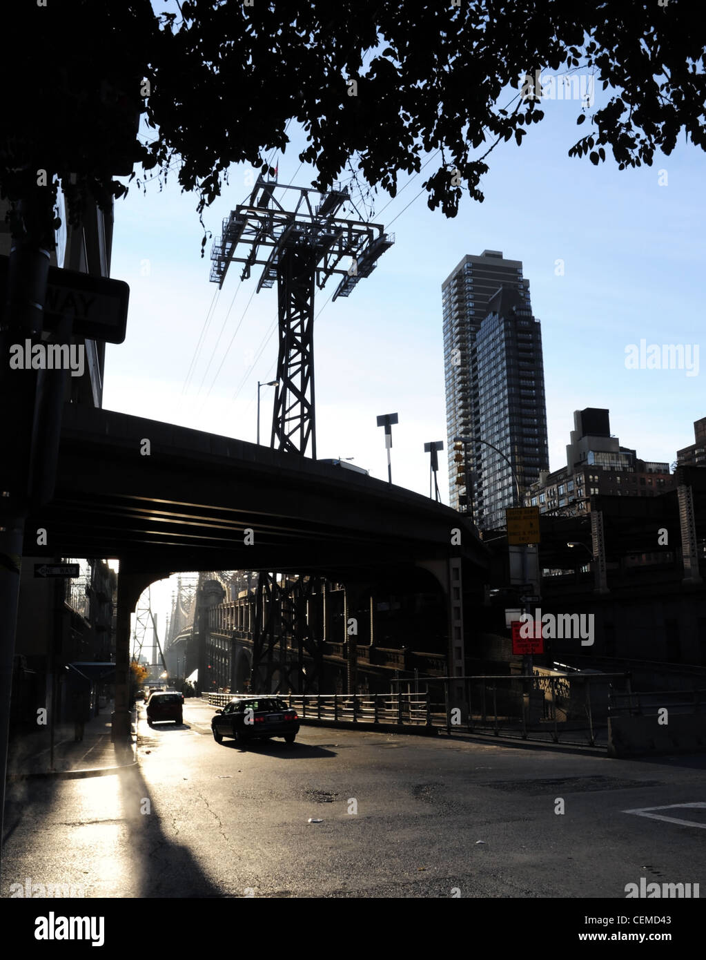 Blue sky early morning sun portrait Roosevelt Island Aerial Tramway and