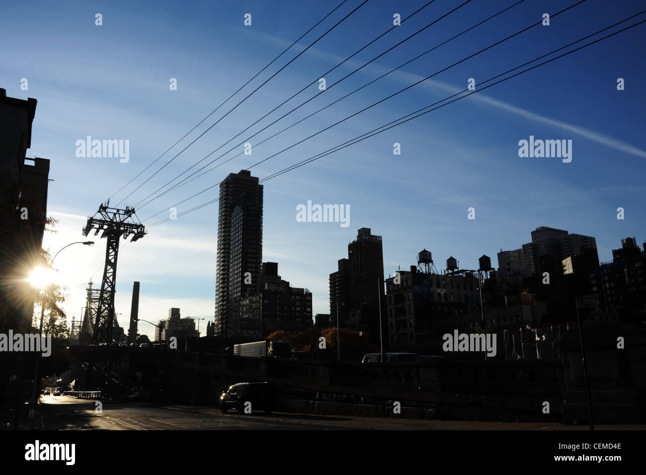 Sunrise silhouette view buildings, watertanks, Queenboro Bridge aerial