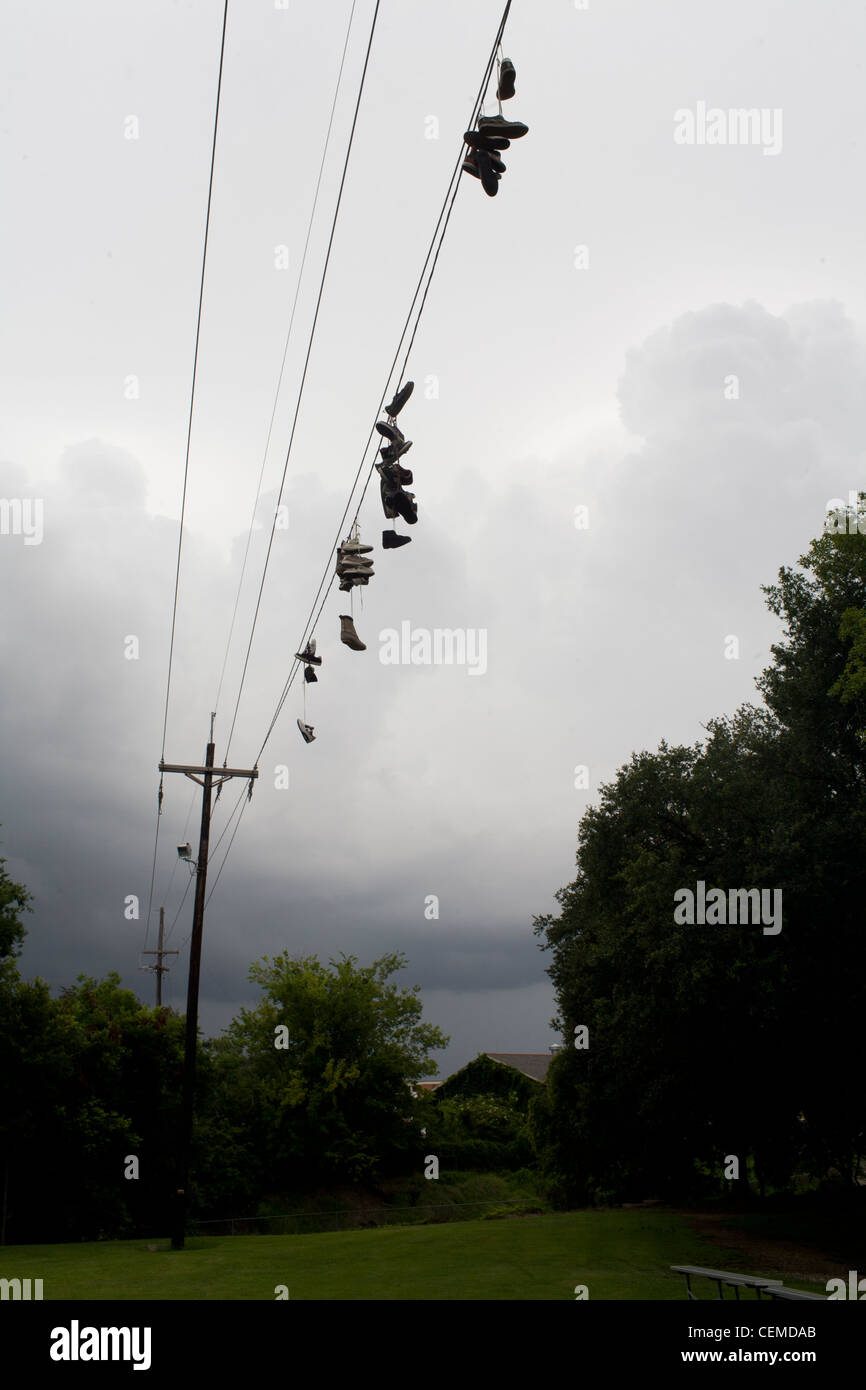 Shoes hanging from overhead power lines in Lafayette, Louisiana, USA