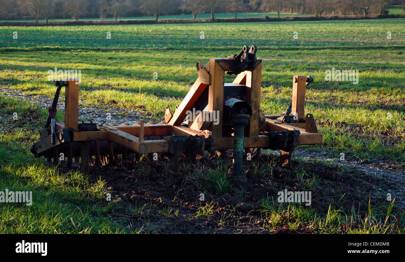 Tractor harrow in sunny Chiltern Hills evening light Stock Photo Alamy