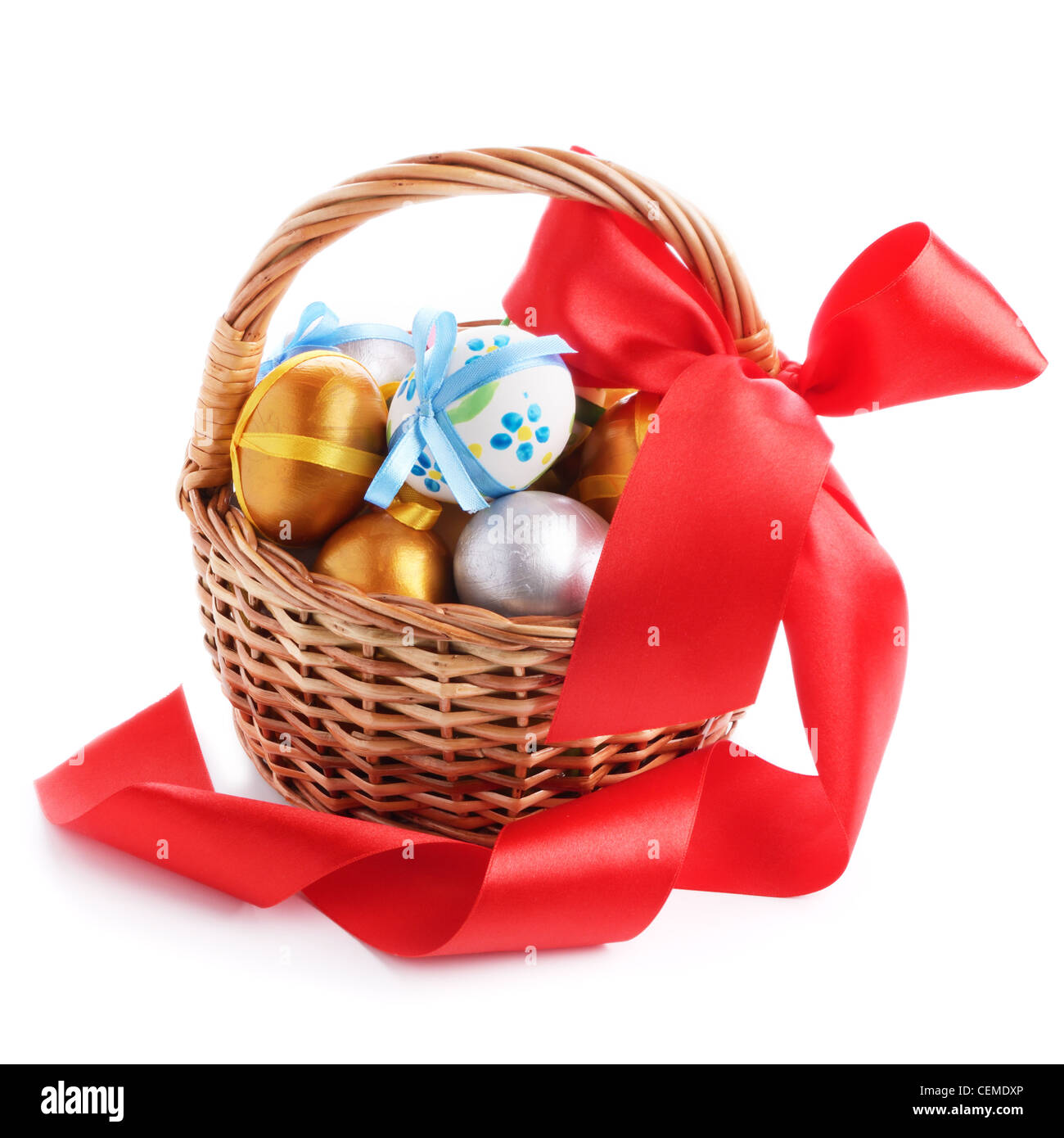 Easter eggs with bows in the basket over white background Stock Photo ...